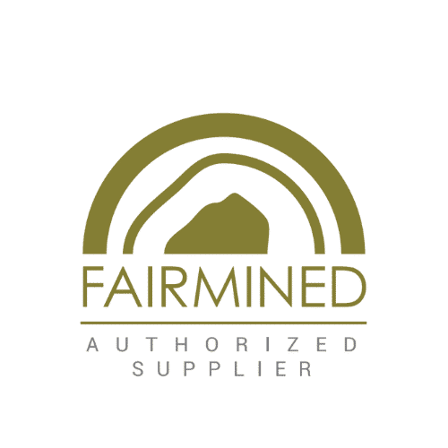 Logotipo Fairmined verde oliva con un arco estilizado sobre una montaña, FAIRMINED en negrita y PROVEEDOR AUTORIZADO en texto más pequeño debajo sobre fondo claro.