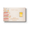 Compleanno: un biglietto di compleanno con una torta illustrata, candeline, coriandoli vivaci, le frasi "tanti auguri" e "Buon Compleanno" e un piccolo lingotto d'oro incastonato sul lato destro.