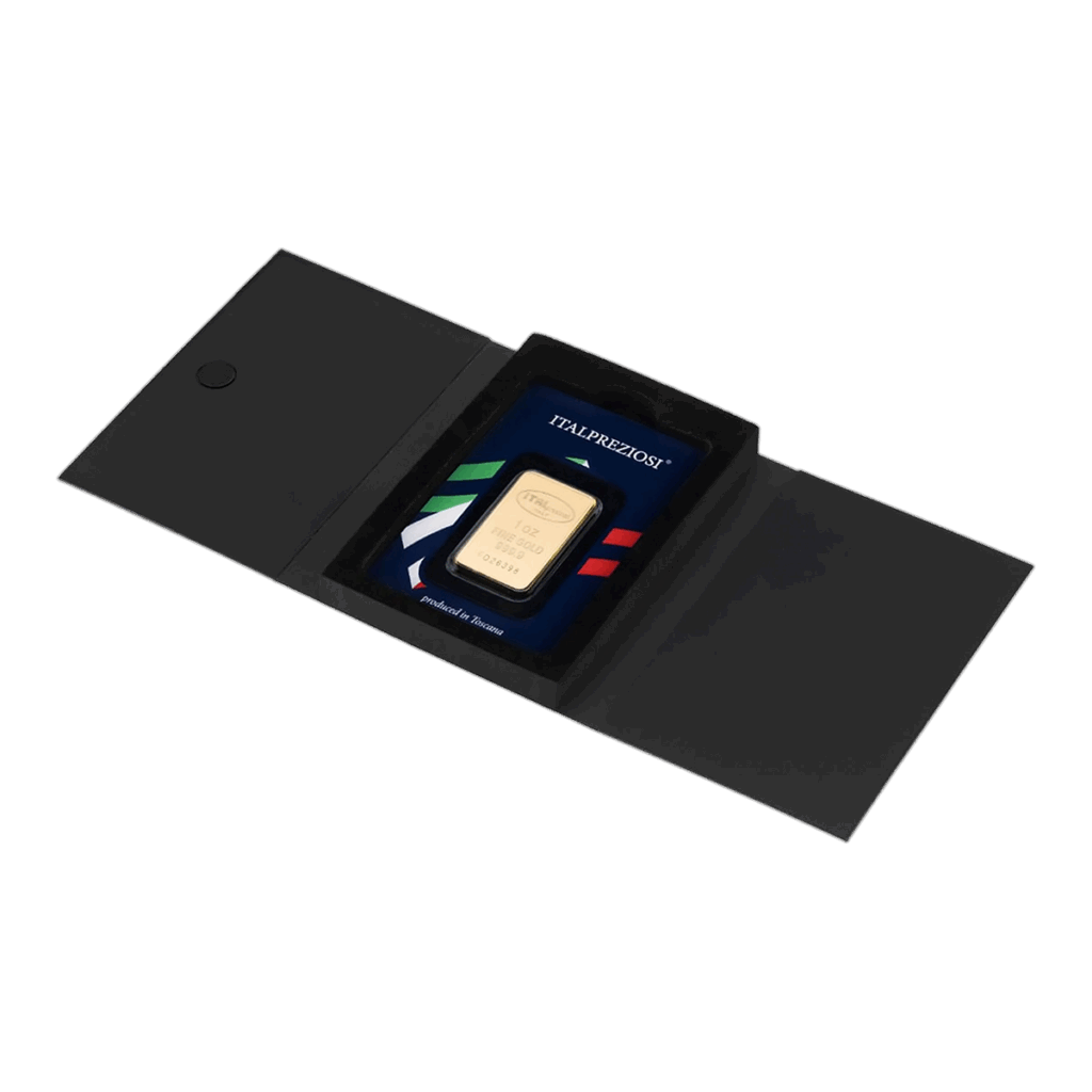 Il Lingotto Oro 1 oncia è sigillato in una custodia protettiva con i colori della bandiera italiana e la scritta "ITALPREZIOSI", esposta all'interno di una cartella nera aperta con chiusura magnetica.