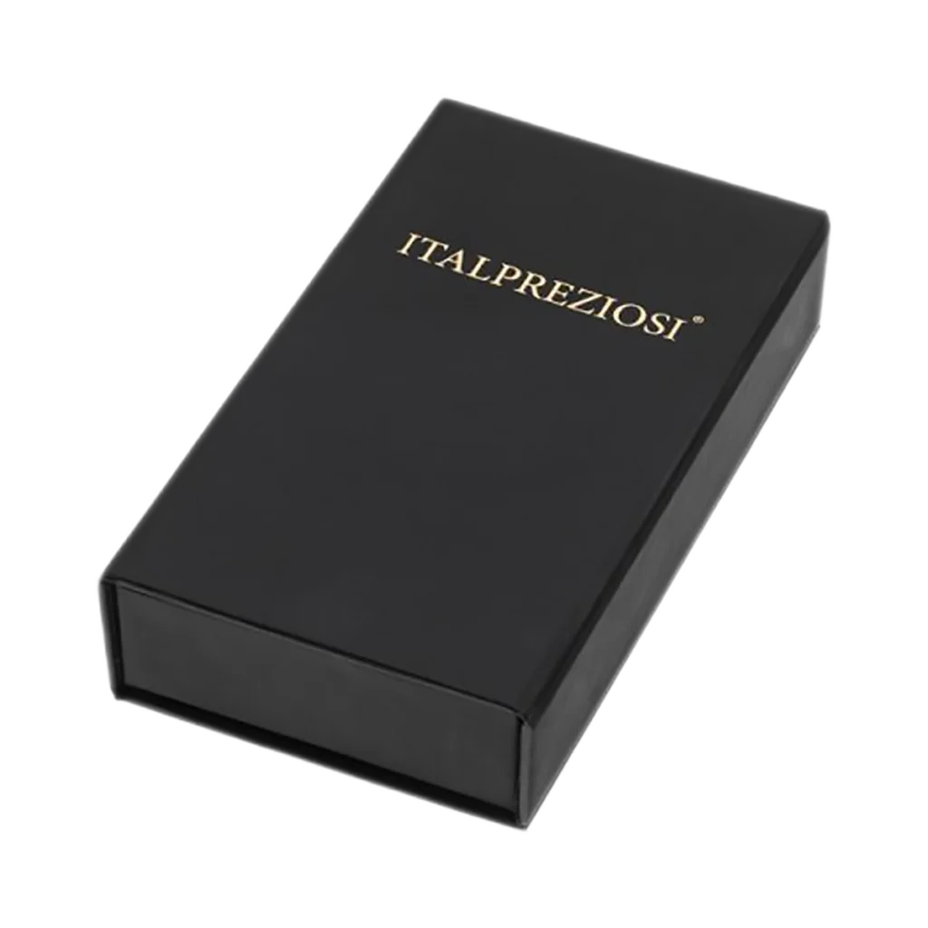 Una caja rectangular negra con la inscripción "ITALPREZIOSI" en mayúsculas doradas en la tapa contiene el Lingote de oro 500gr, sobre fondo blanco.