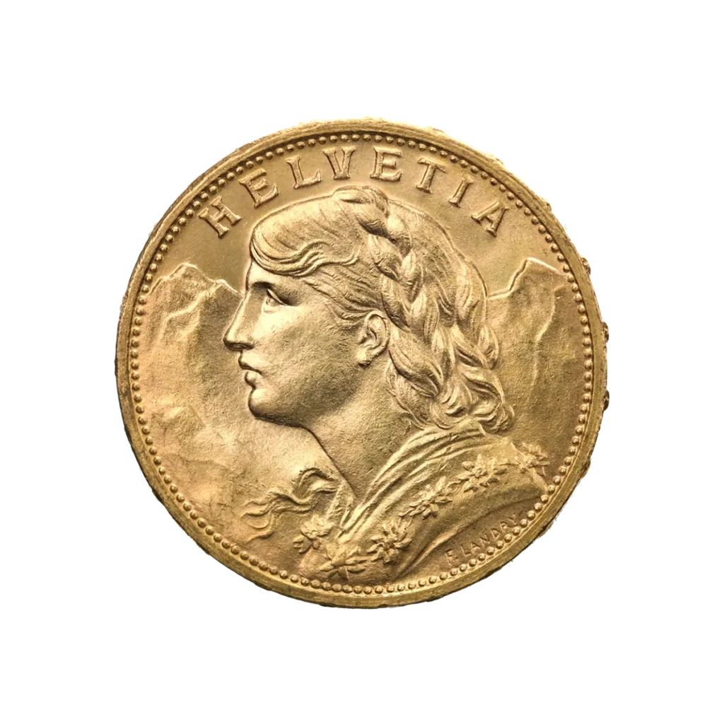 La moneda de oro de 20 francos suizos Vreneli Oro 1897-1949 muestra una mujer con el pelo trenzado de perfil, montañas al fondo y HELVETIA inscrita en la parte superior.