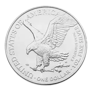 Moneda de plata American Eagle que muestra un águila aterrizando sobre una rama, con la inscripción UNITED STATES OF AMERICA, ONE DOLLAR, 1 OZ. PLATA FINA, y E PLURIBUS UNUM.