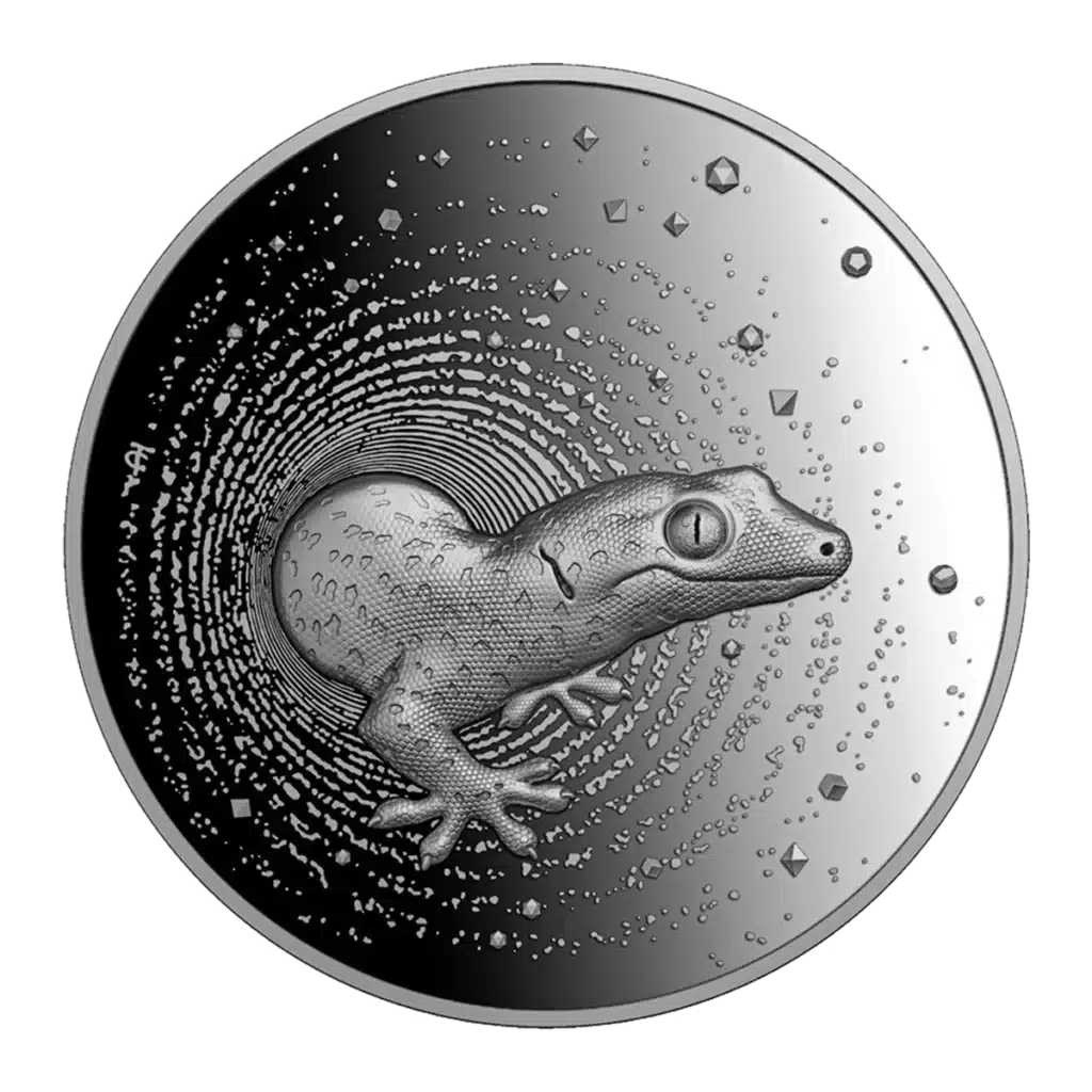 La moneda de plata Camerún 2023 Gecko 2 oz Plata Proof UHR muestra un gecko finamente repujado que emerge de círculos concéntricos y formas geométricas, creando un llamativo efecto tridimensional.