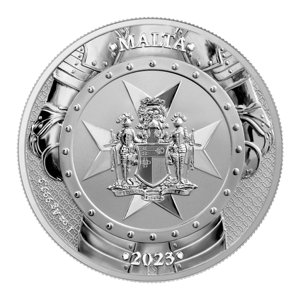 La moneta 2023 Cavalieri del Passato 5 Euro 1 oz Argento Fior di Conio è una moneta d'argento con la croce di Malta, uno stemma centrale, armature e scudi sul bordo, "MALTA" in alto e "2023" in basso.