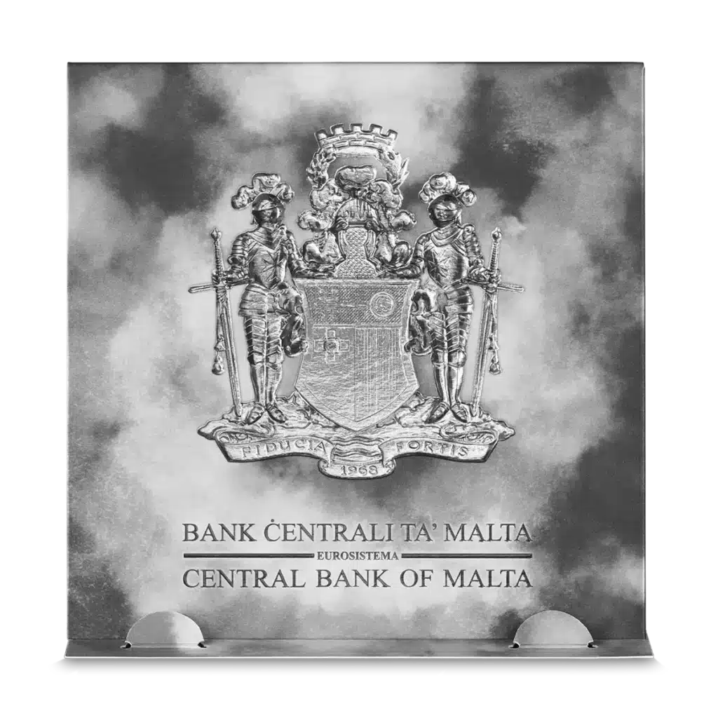 The 2023 Knights of the Past 5 Euro 1 oz Silver BU features Malta’s coat of arms with two armored figures by a shield and the inscription: BANK ĊENTRALI TA’ MALTA EUROSISTEMA CENTRAL BANK OF MALTA.