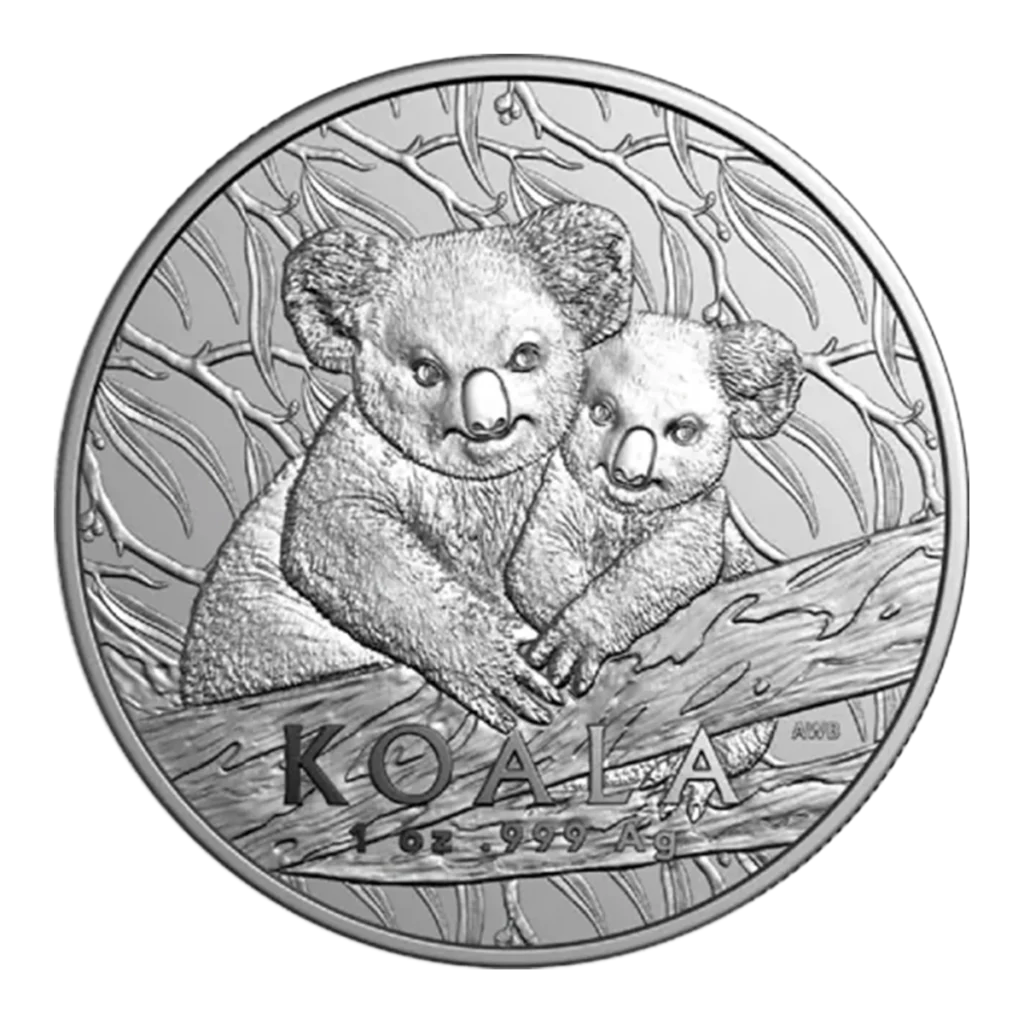 La moneda de plata de 1 oz Koala Australiano Plata 2025 muestra dos koalas sobre una rama de árbol con hojas al fondo, y lleva inscrito "KOALA" y "1 OZ .999 AG" en la parte inferior.
