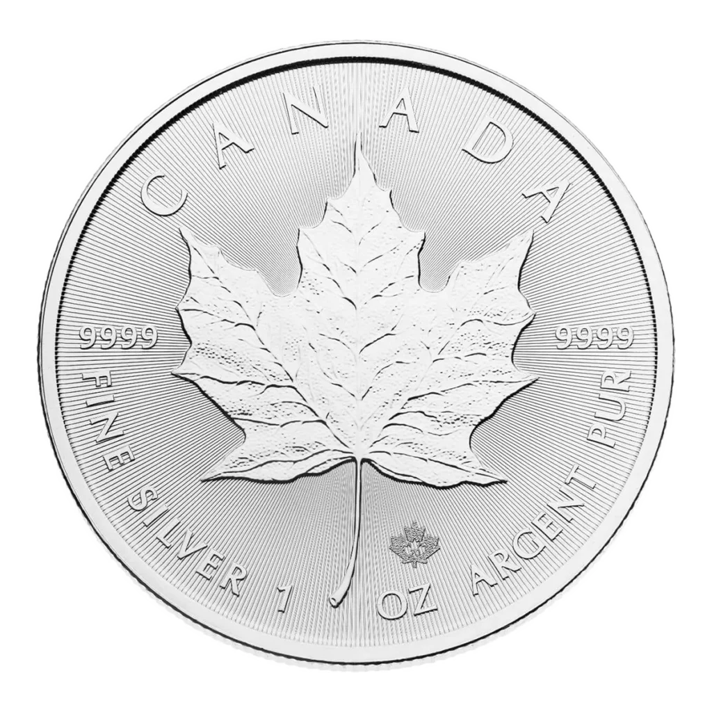 La Hoja de Arce Plateada es una moneda de plata canadiense con una detallada hoja de arce en el centro e inscripciones: CANADA, FINE SILVER 1 OZ ARGENT PUR, y 9999 alrededor del borde.
