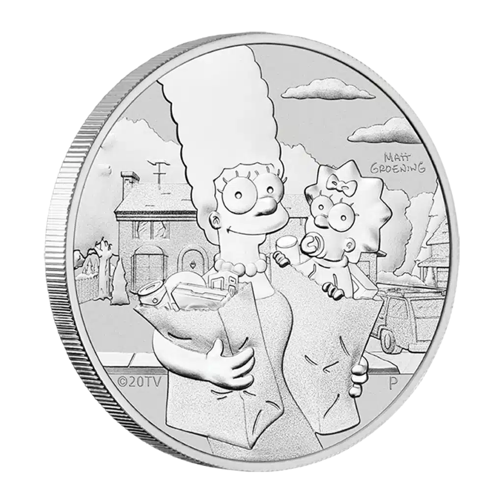 The 2021 Tuvalu The Simpsons: Marge and Maggie 1 oz Silver BU coin shows Marge holding grocery bags with Maggie in one arm, set in a suburban scene, detailed engraving, and “Matt Groening” inscribed in the background.