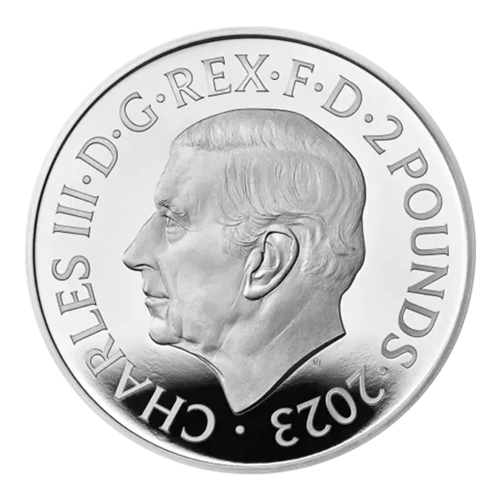 Una moneda de plata de 2 Libras, la 1 oz Bestias Tudor - Toro de Clarence Plata Proof 2023, muestra un retrato del Rey Carlos III mirando hacia la izquierda con la inscripción CHARLES III - D - G - REX - F - D - 2 POUNDS - 2023.
