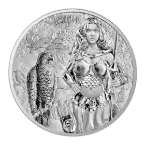 La moneda de 2025 Valquirias: La moneda Arnhild 1 oz Plata BU muestra a una mujer guerrera con armadura y una lanza junto a una gran águila, en un entorno de montañas, bosques y un pueblo, con un grabado detallado y un carcaj de flechas en el suelo.