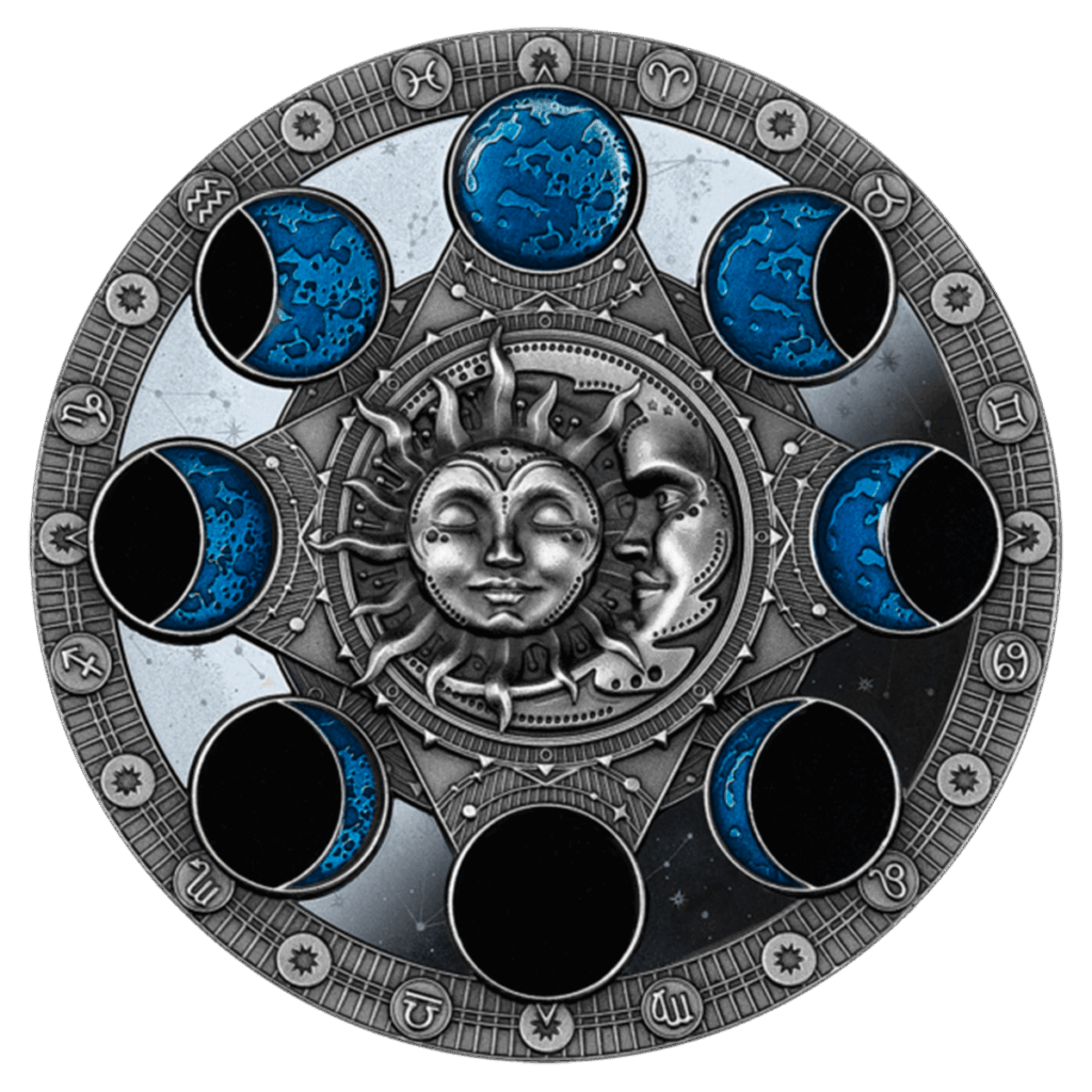 El Calendario Lunar 2 Dólares presenta una ilustración circular de fases lunares azules y negras alrededor de un sol y una luna centrales con caras, rodeados de símbolos zodiacales sobre un borde decorativo plateado.