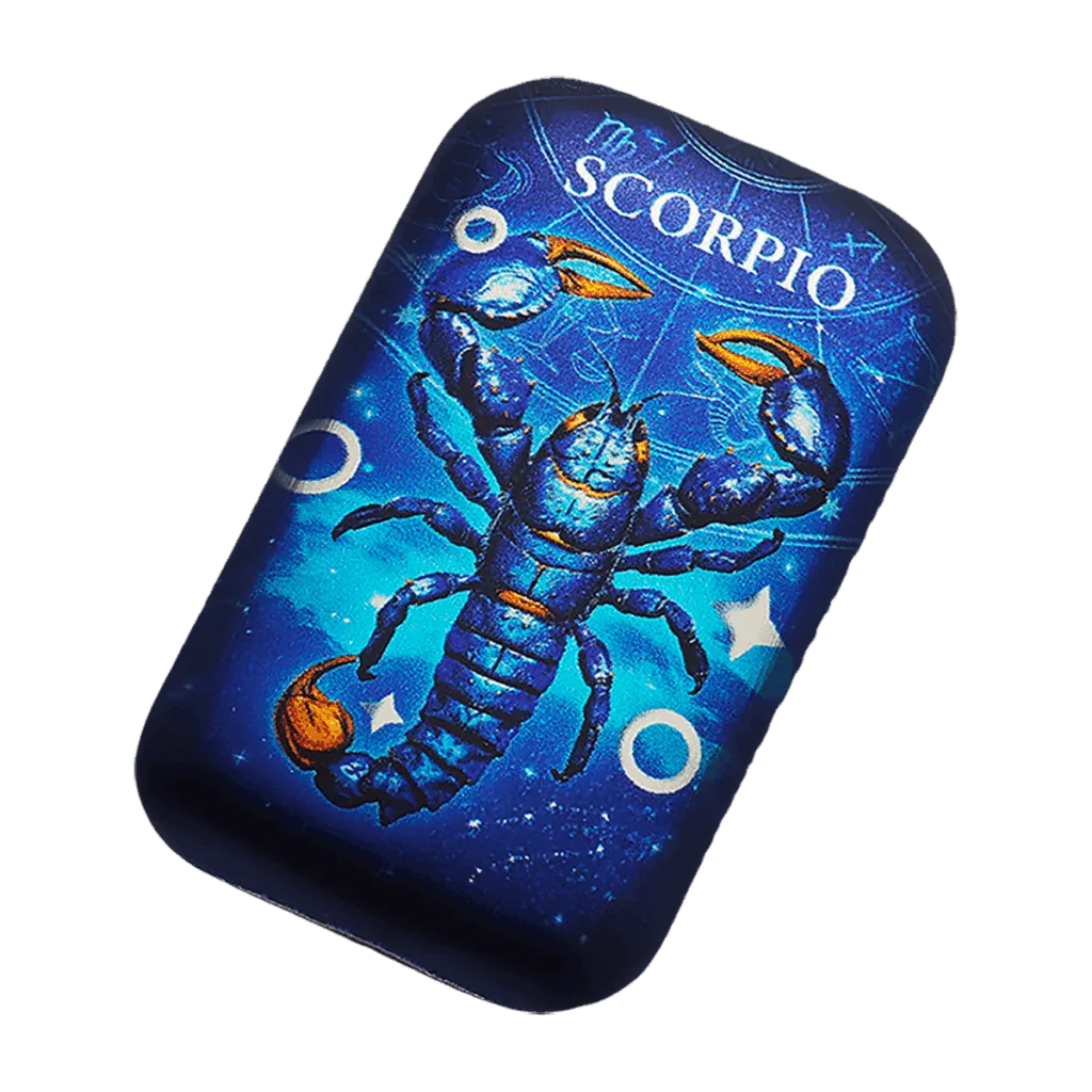 Tilted view of the rectangular 2 oz silver collector bar featuring the Scorpio zodiac sign: a blue scorpion with orange accents against a starry blue background, with “SCORPIO” at the top.<br>