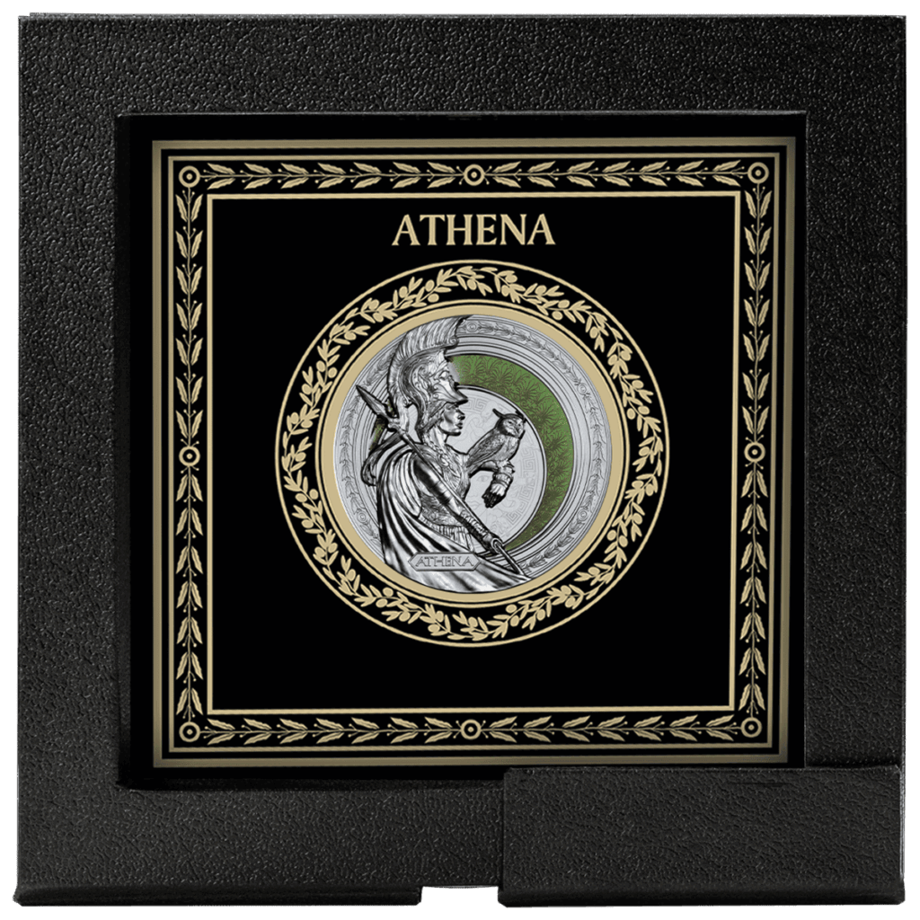 Moneda Atenea 2025 en plata presentada en un estuche de colección con marco.