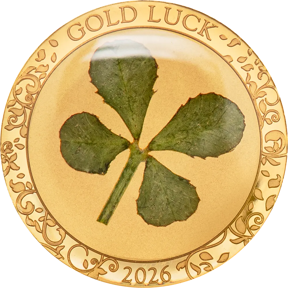 La moneta Gold Luck 2026 da 1 g in oro 999.9 proof racchiude un vero quadrifoglio verde sotto la superficie, incorniciato da decori floreali incisi e dalle scritte GOLD LUCK e 2026.