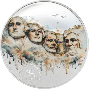 La moneta World Landmarks - Monte Rushmore da 1/2 oz in argento 999.9 proof raffigura ad acquerello i volti dei quattro presidenti scolpiti nella roccia, con gabbiani in volo, colature di colore e il logo World Landmarks Mount Rushmore 2026.