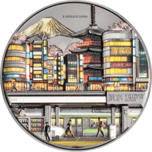 La moneta 3 Levels of Japan da 2 oz in argento 999,9 nero proof mostra a colori, su più livelli di rilievo, il binario di una stazione con un treno e i passanti, i palazzi illuminati di Tokyo con le insegne, una pagoda, i ciliegi in fiore e il monte Fuji, con le scritte 3 LEVELS OF JAPAN e TOKYO JAPAN.
