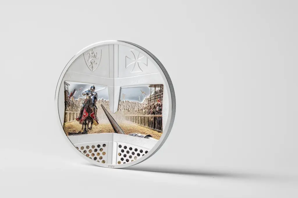 Moneta Knight Games - Giostra di tre quarti su fondo bianco, dal lato della visiera.